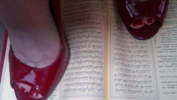 Kur'an' ayaklar altna alan saygsz bulundu