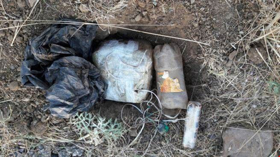 Ter�ristler taraf�ndan araziye d��enen ve �ivilerle desteklenmi� el yap�m� patlay�c� ele ge�irildi