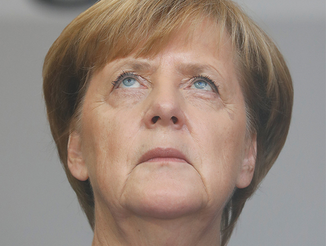 Merkel, Almanya'daki Trk semenlere 'Trke' afilerle seslendi