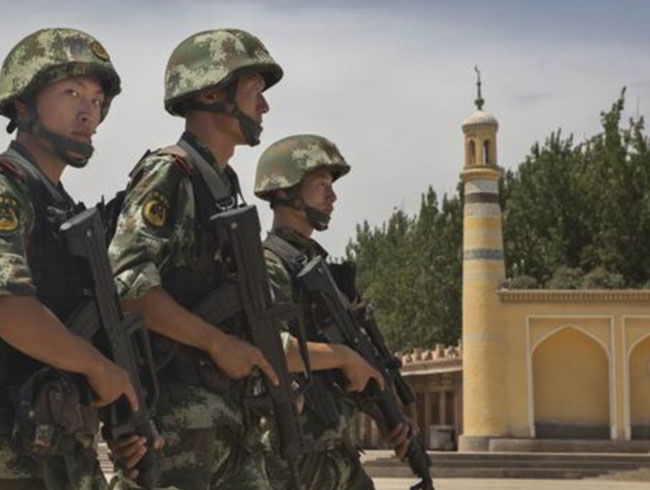 in polisi, Xinjiang'daki aznlk Mslmanlarn tm Kur'an nshalarn yetkililere teslim etmesini istedi 