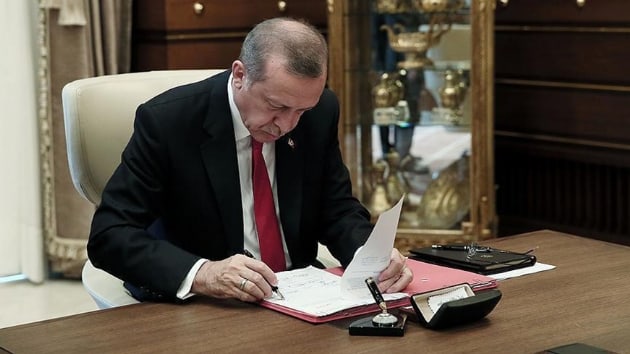 Cumhurbakan Erdoan 26 kanunu onaylayarak Babakanla gnderdi