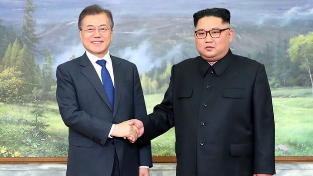 Gney ve Kuzey Kore liderleri tarafsz blgede bulutu