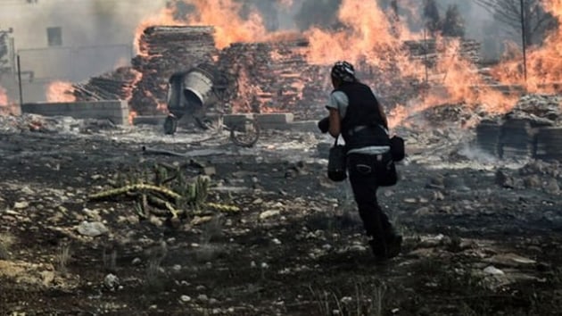 Yunanistan Babakan ipras yangn trajedisinin siyasi sorumluluunu stlendi