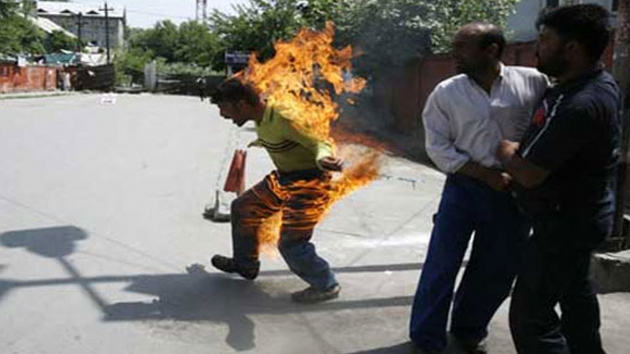 ran'n bakenti Tahran'da bir esnaf kendini yakt