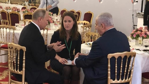 srail Babakan Netanyahu ile Rusya Devlet Bakan Putin, Tel Aviv ve Moskova arasnda yaanan gerginliin ardndan Elysee Saray'nda bir sre sohbet etti