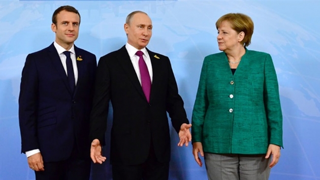 Putin, Merkel ve Macron ile Suriye'yi grt
