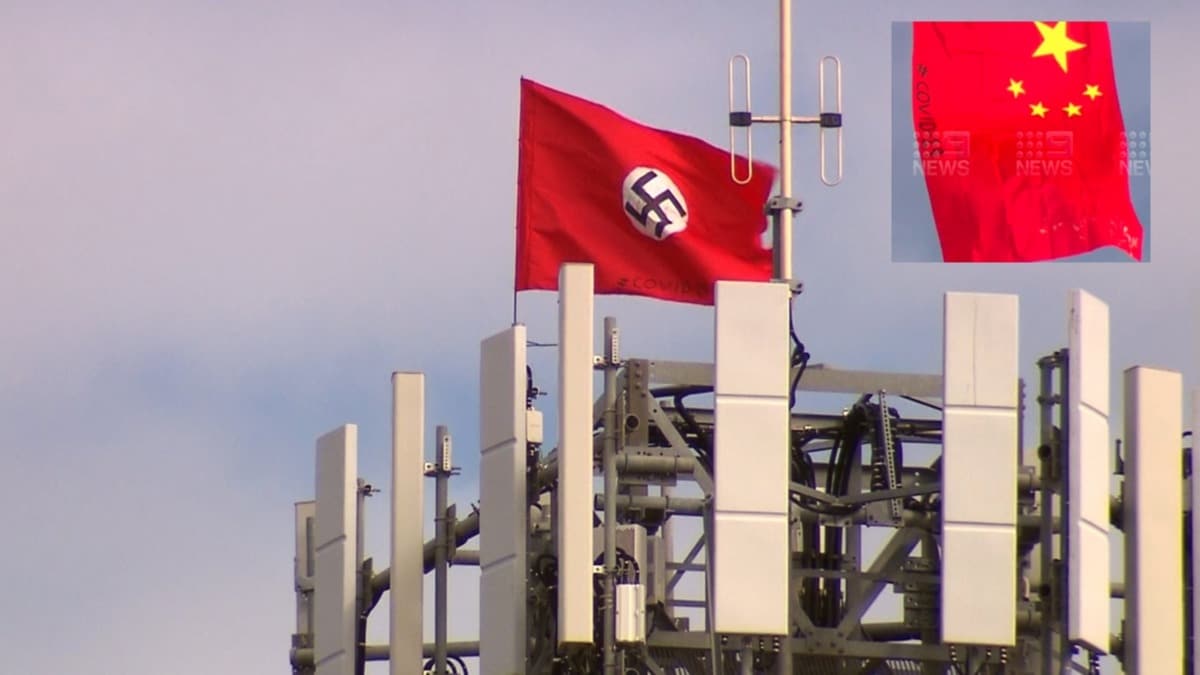lkeyi kartran grnt: in ve Nazi bayraklar asld