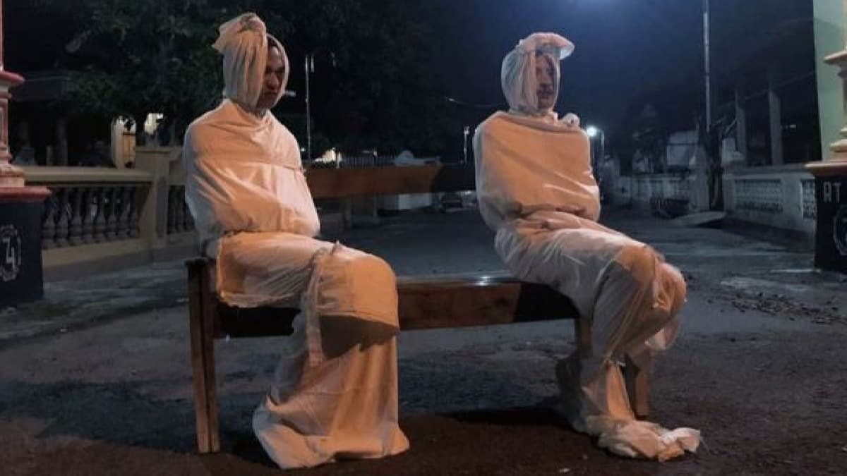 Koronavirsle ilgin mcadele! 'Kefenli hayaletler' devriye geziyor