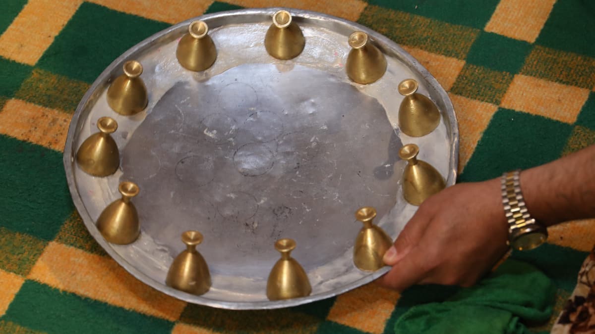 Ramazan gecelerinin vazge�ilmez e�lencesi... T�rkmenlerin milli oyunu: Sini Zarf