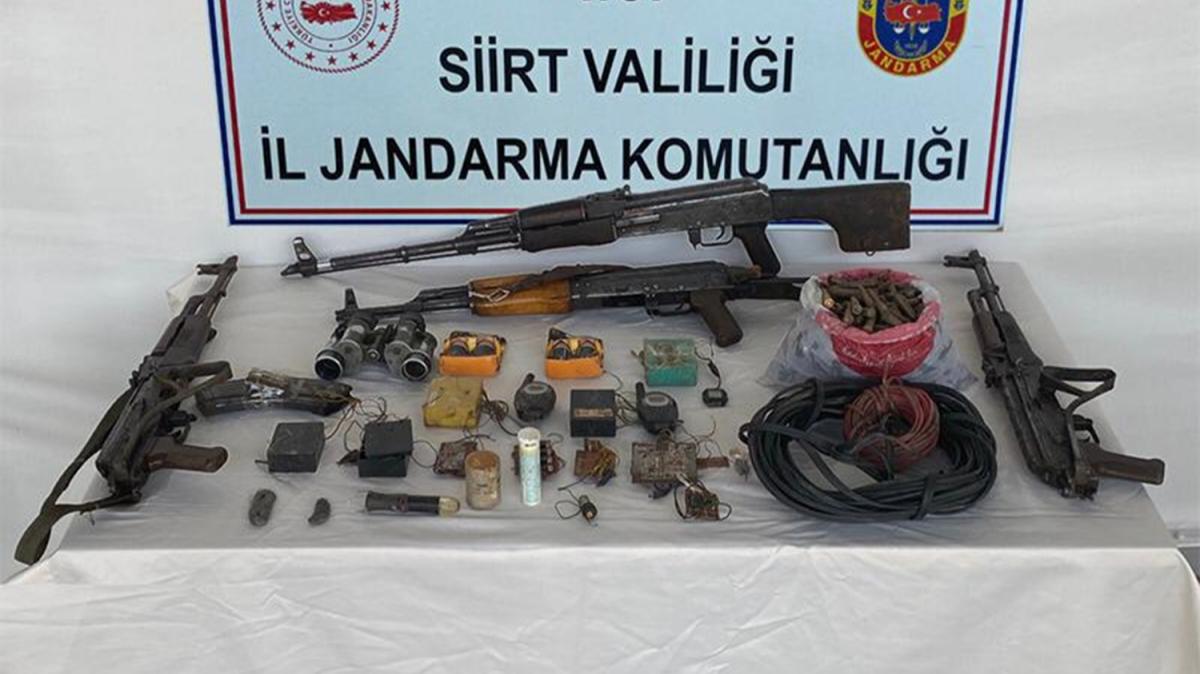 Siirt'te kayalklarn arasna gizlenmi PKK'l terristlere ait silah ve mhimmat yakaland