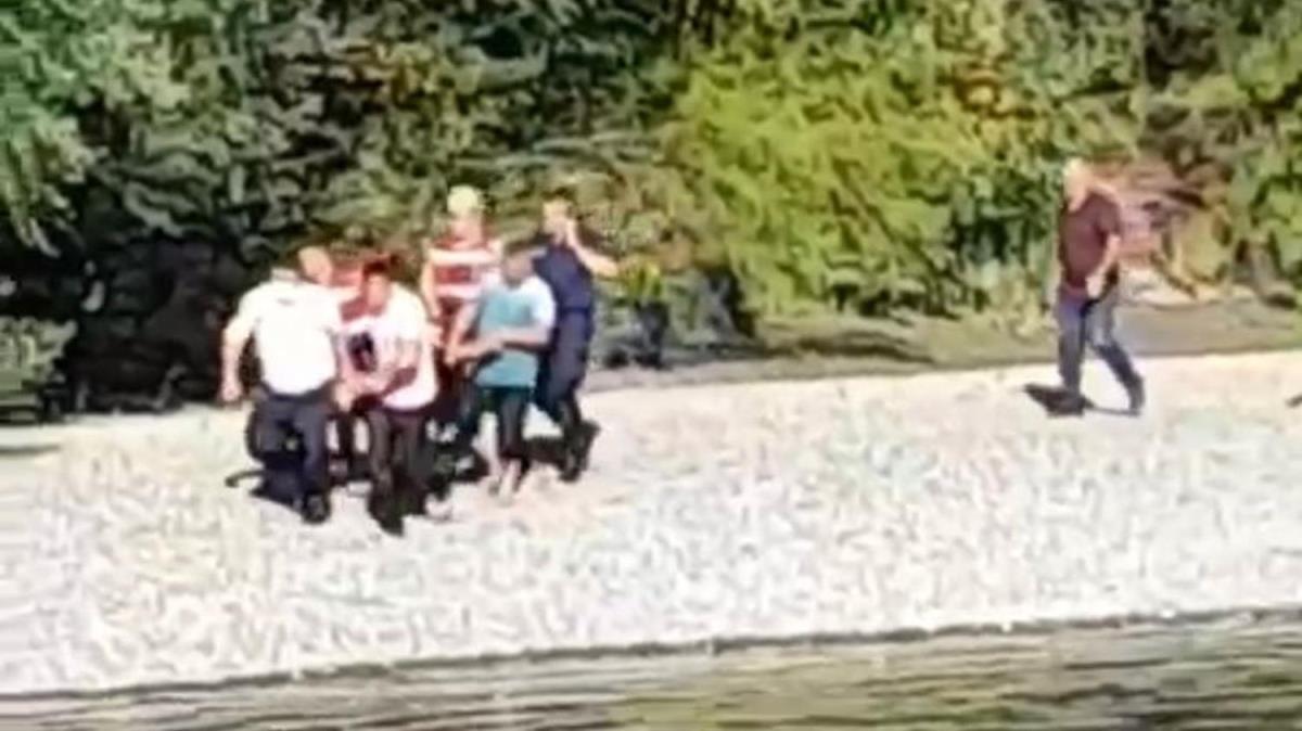 Serinlemek iin girdikleri glde rpnan anne ve 3 ocuunu kurtard, kendisi bouldu