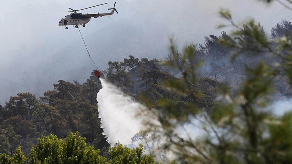 Marmaris ile Kyceiz'deki orman yangnlarna havadan ve karadan mdahale ediliyor