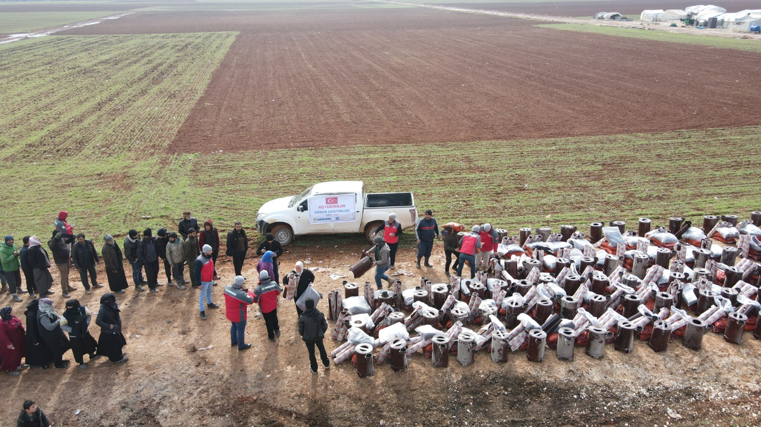 Bin ton k�m�r ve 2 bin soba yard�m� yap�ld�