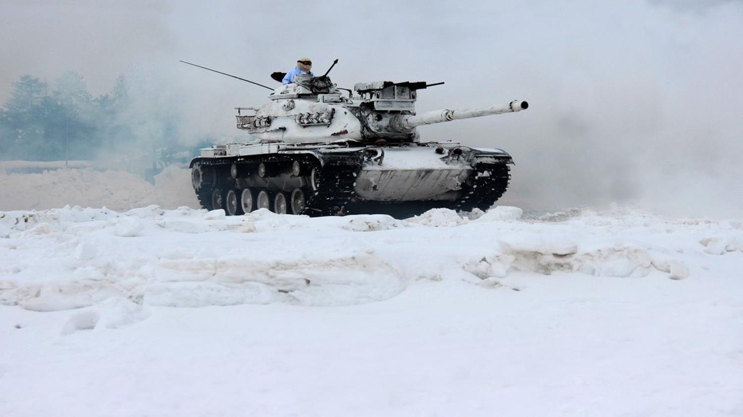 Mehmet�ikten karla kapl� b�lgede e�itim