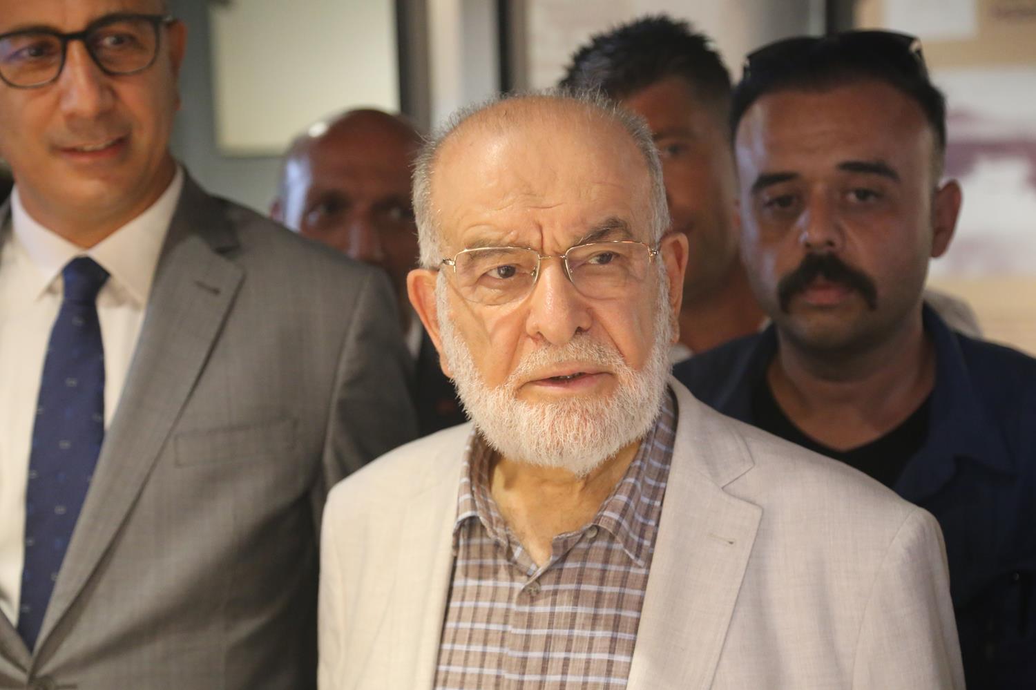 Karamollao�lu'ndan itiraf gibi a��klama: 6'l� masan�n b�y�k �nemi kalmad�